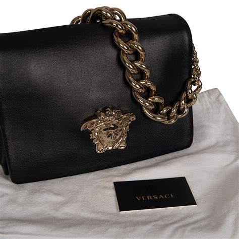 Versace: Black Palazzo Bag 